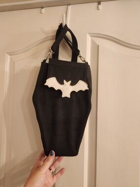 Black Coffin-Shaped Backpack with White Bat Accent